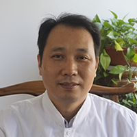 薛国平